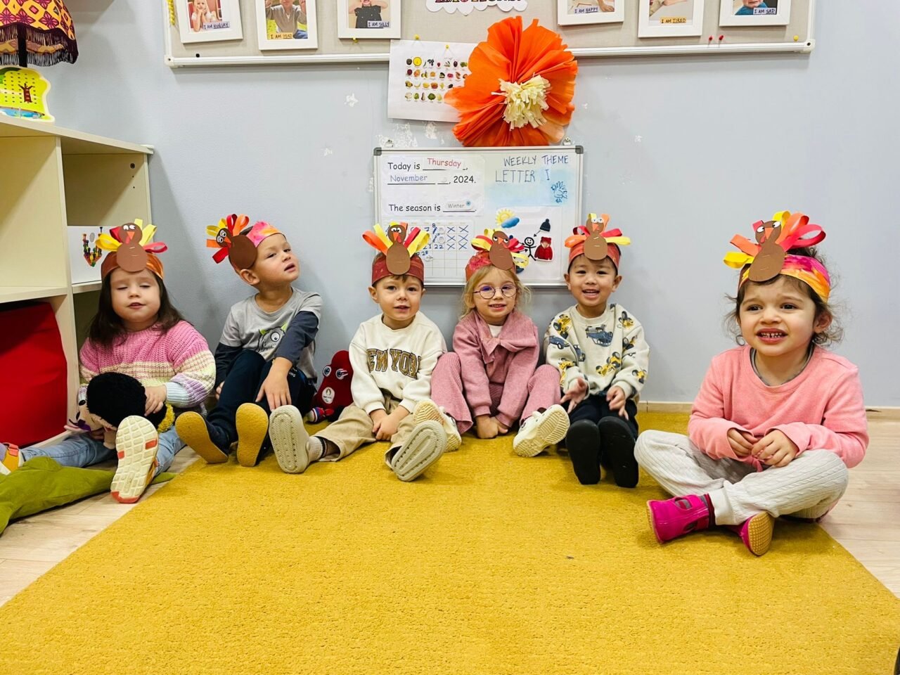Early Years students from Perrott Hill on thanksgiving day wearing a themed hat